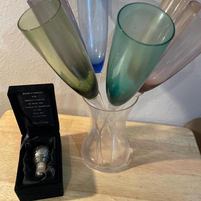 Colored glass in a vase with Neiman Marcus Cork