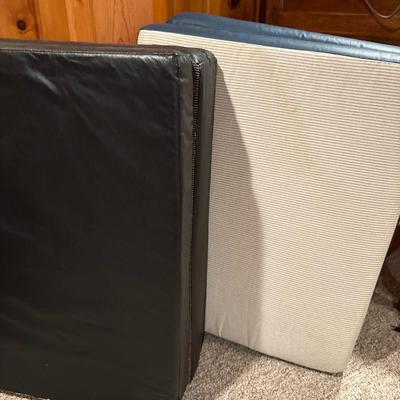 Two folding sleep mats