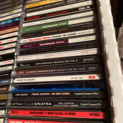 Large selection of CDs with cassette tape holders