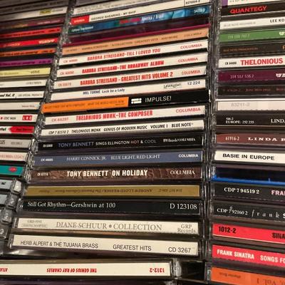 Large selection of CDs with cassette tape holders