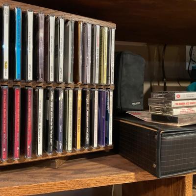 Large selection of CDs with cassette tape holders