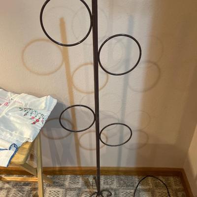 Embroidered pillowcases, table, runners, and holder