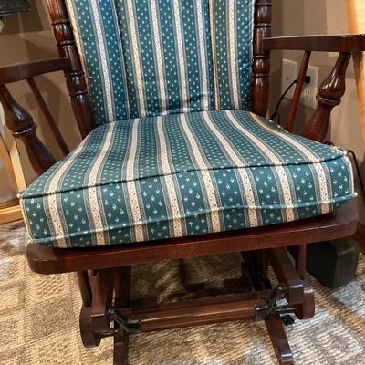 Dark wood and green pad glider