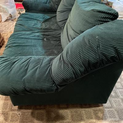 Emerald green and wood trim love seat