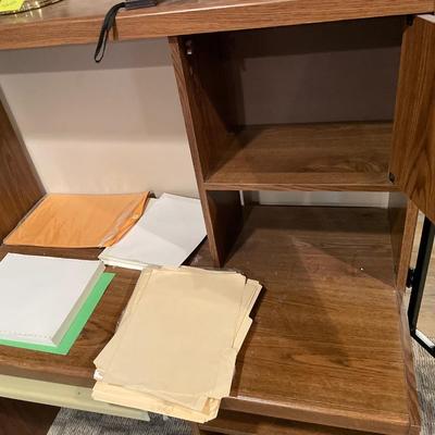 Office desk with folders and paper