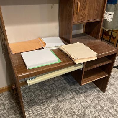 Office desk with folders and paper