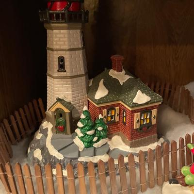 Lighthouse, horse, and sleigh and house
