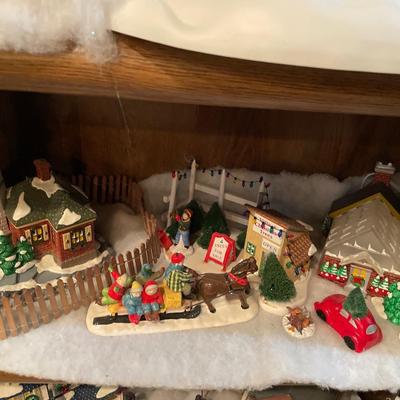 Lighthouse, horse, and sleigh and house