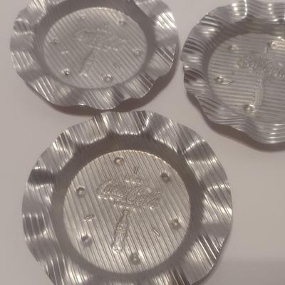 Set of Three Mid-Century Hammered Aluminum Coca-Cola Ashtrays