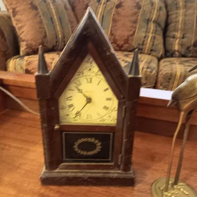 SESSIONS ELECTRIC CLOCK AND A BRASS CRANE