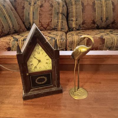 SESSIONS ELECTRIC CLOCK AND A BRASS CRANE