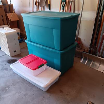 2 LARGE STORAGE CONTAINERS WITH 2 WHEELS ONE END