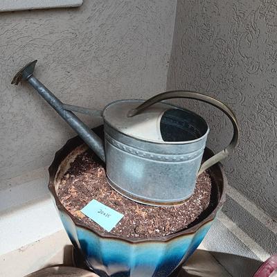 PLASTIC LARGER AND CLAY FLOWER POTS PLUS METAL WATERING CAN