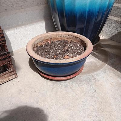 PLASTIC LARGER AND CLAY FLOWER POTS PLUS METAL WATERING CAN