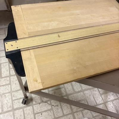 Vintage metal table on wheels, basket, footstool, and