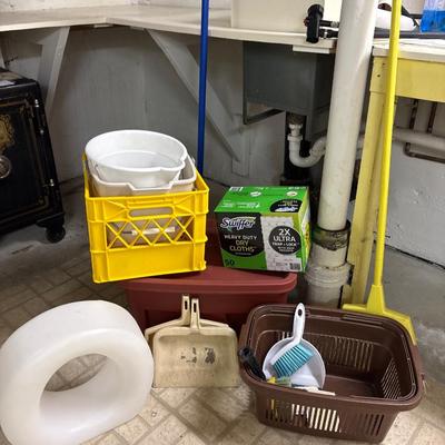 Toilet riser, buckets, and cleaning supplies
