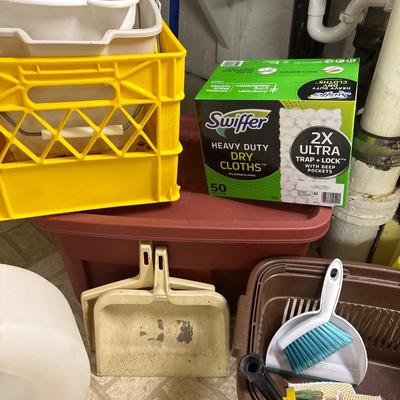 Toilet riser, buckets, and cleaning supplies