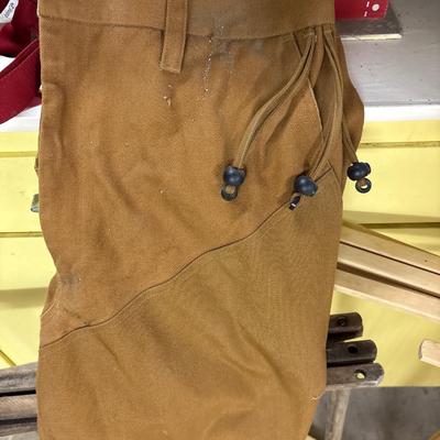 Two laundry racks and Vintage work pants