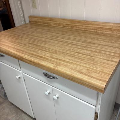 Cupboard with butcher block-look top