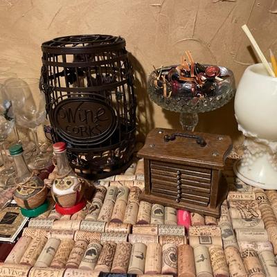 Wine cork holders and wine glasses