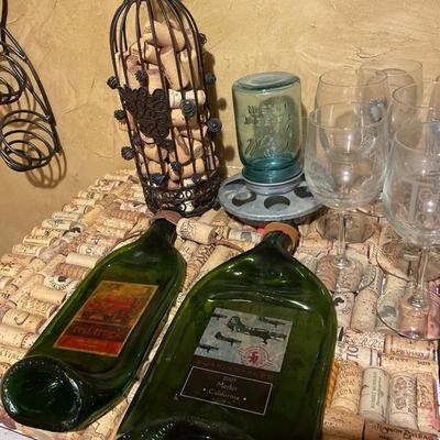 Wine cork holders and wine glasses
