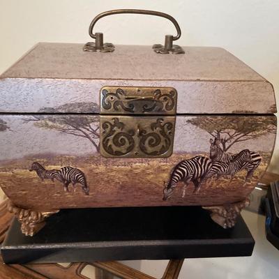 Zebra safari box with candles and glass frogs