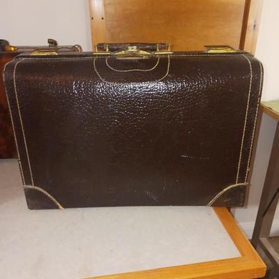 THREE VINTAGE SUITCASES