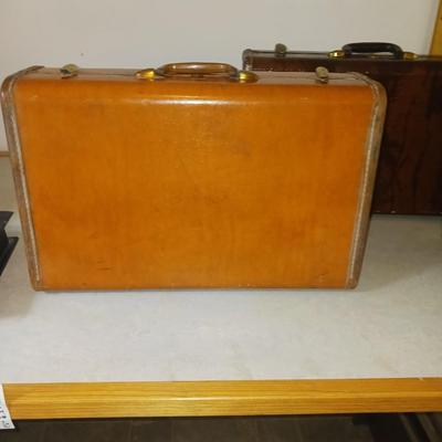 THREE VINTAGE SUITCASES