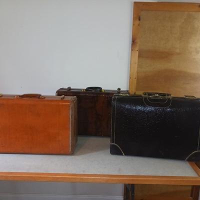 THREE VINTAGE SUITCASES