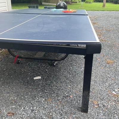 Sale Photo Thumbnail #26: Table is missing a screw, causing it to bend on one side.