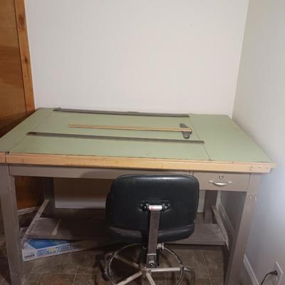 DRAFTING TABLE W/ CHAIR, TOOLS AND LARGE SHEETS OF PAPER