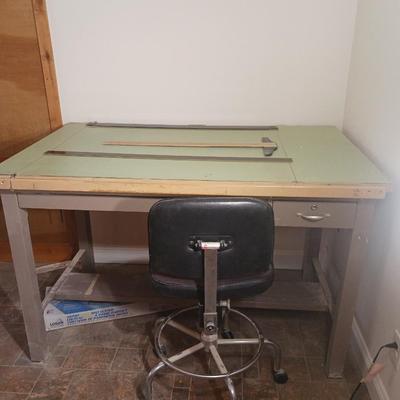 DRAFTING TABLE W/ CHAIR, TOOLS AND LARGE SHEETS OF PAPER
