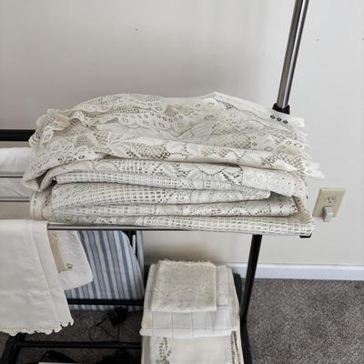 LOT 106: Siltec Scale, Vintage Linens, Shoe Stretchers, Compact Ironing Board, Laundry Organizing Rack