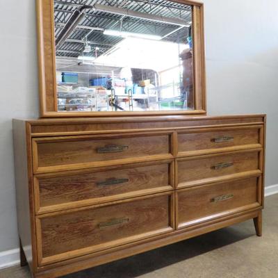 Sale Photo Thumbnail #50: This online auction features a wide variety of items including mid-century furniture, power tools, Craftsman tool chest, Bernhardt leather chair, Celestron telescope, sports memorabilia, Colt replica revolvers, kitchen cookware, Warther cutlery, Univega b