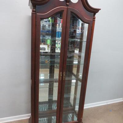 Sale Photo Thumbnail #1: This online auction features a wide variety of items including mid-century furniture, power tools, Craftsman tool chest, Bernhardt leather chair, Celestron telescope, sports memorabilia, Colt replica revolvers, kitchen cookware, Warther cutlery, Univega b