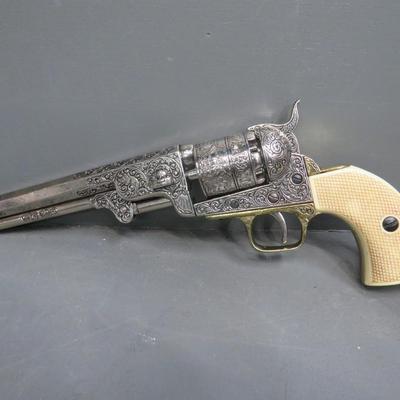 Sale Photo Thumbnail #39: This online auction features a wide variety of items including mid-century furniture, power tools, Craftsman tool chest, Bernhardt leather chair, Celestron telescope, sports memorabilia, Colt replica revolvers, kitchen cookware, Warther cutlery, Univega b