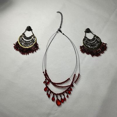 Red beaded Necklace, red beaded and bronze pieced earrings.