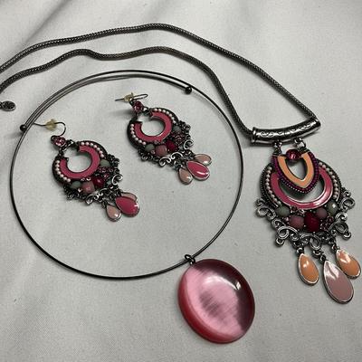 Silver with pink colored stones
