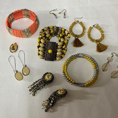 Yellow/silver bracelets, PE, Clip Earrings, & orange/gold bracelet