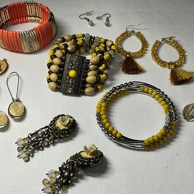 Yellow/silver bracelets, PE, Clip Earrings, & orange/gold bracelet