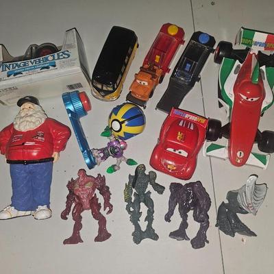 Sale Photo Thumbnail #69: Toy Lot | Action Figures, Pokémon, Diecast Tractor, Disney Cars