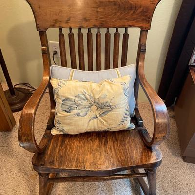 Vintage rocking chair with pillows