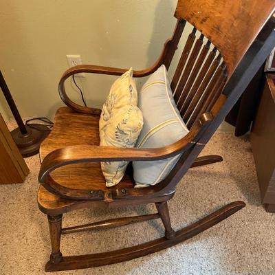 Vintage rocking chair with pillows