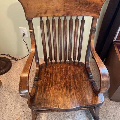 Vintage rocking chair with pillows