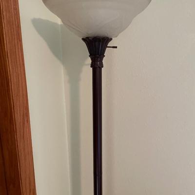 Floor lamp with clear shade on top