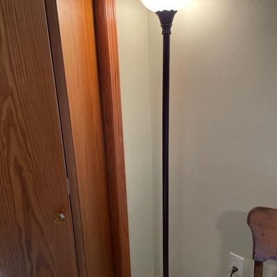 Floor lamp with clear shade on top