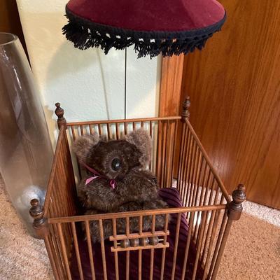 Small decorative play pen with shade and tall clear glass