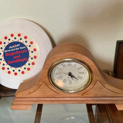 Wooden boot wine holder, vintage frisbee, and clock