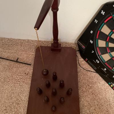Dart board and bowling game