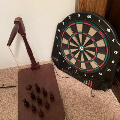 Dart board and bowling game